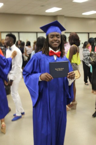 Anfernee Owens show off that hard-earned diploma