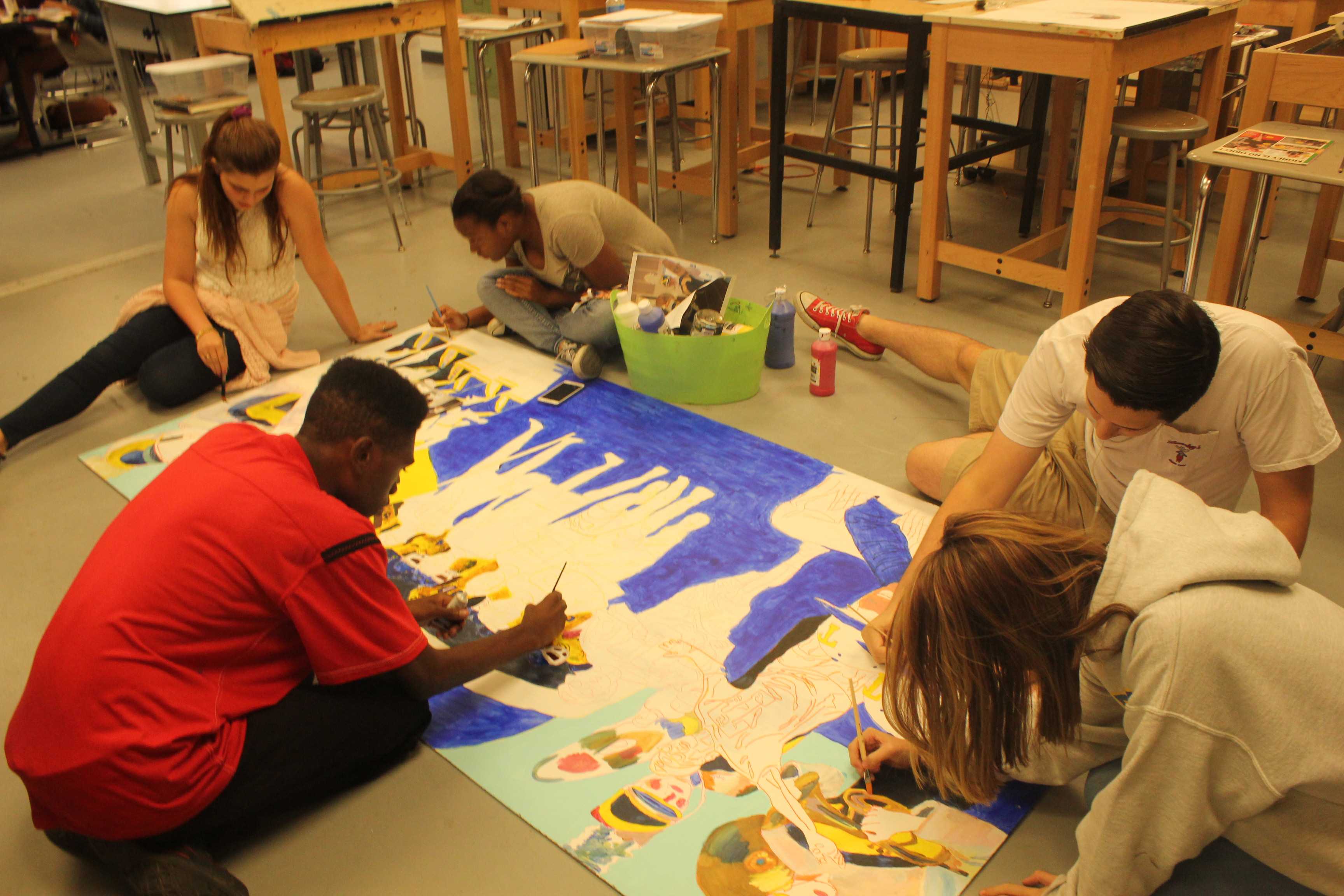 Tupelo+High+art+students+paint+mural+to+show+school+spirit