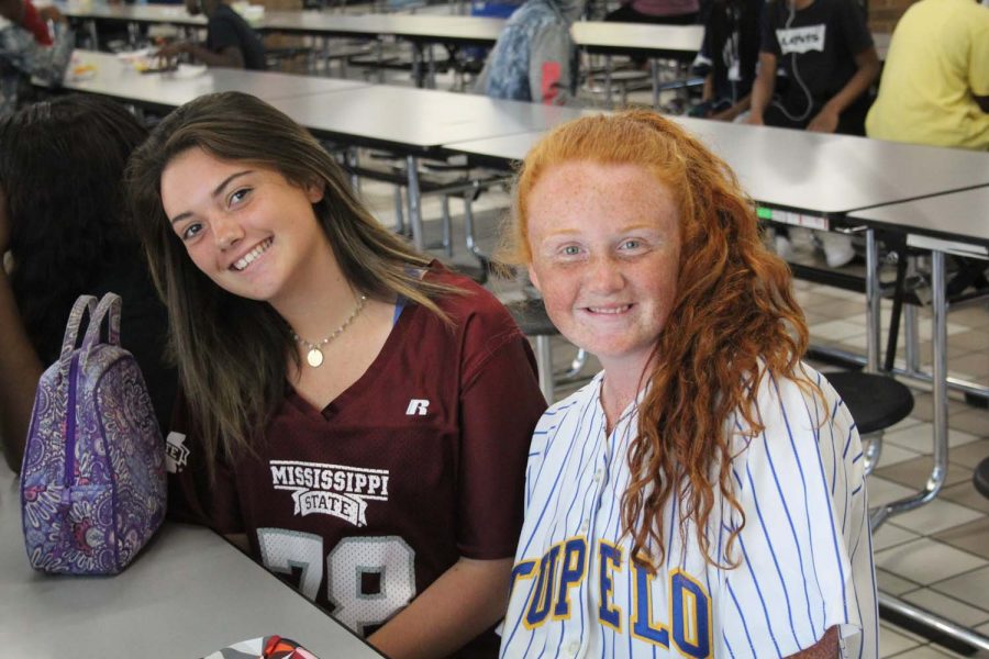 Natalie Cook and Haley Frederick posing for jersey day