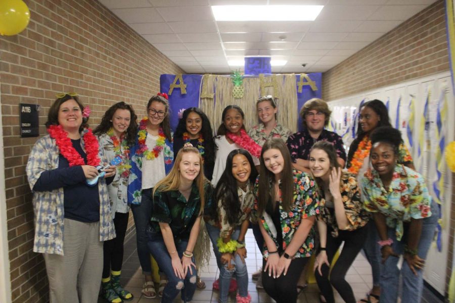 THS Yearbook Album staff posing for Hawaiian Day