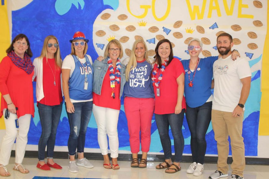 Teachers in H building posing for America day