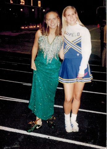 Senior Homecoming Maid, Ginger Enis poses with bedazzled cleats at Homecoming 1995.  Enis was also selected as Miss THS for the class of 1996.