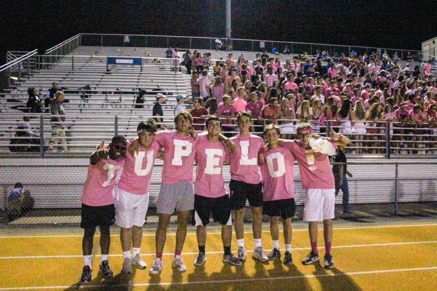 The Tupelo Boys have many jobs during the football game.  They threw t-shirts to the crowd at the Pink Out game v. Olive Branch.  