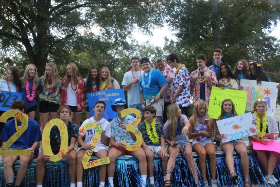 The freshman class of 2023 holds a luau in preparation for the Wave that’s coming.  