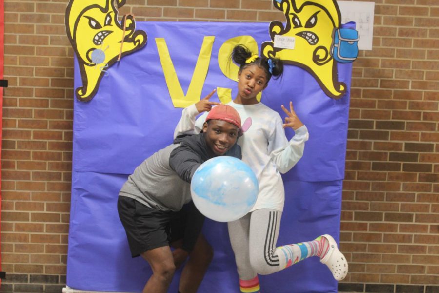 Seniors turned elementary students Kyion White and  play ball by the Golden Wave Media Photo Booth on Day 2 of Homecoming. 
