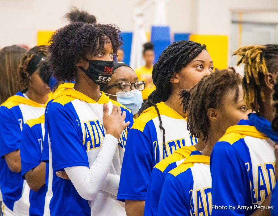 Jade Rucker lines up for the National Anthem before the Lady Wave Basketball Game v. Olive Branch January 8.  