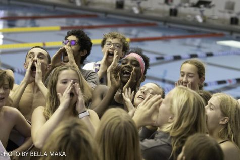 Tupelo swimmers cheering their pre-meet chants at the Tupelo invitational. 