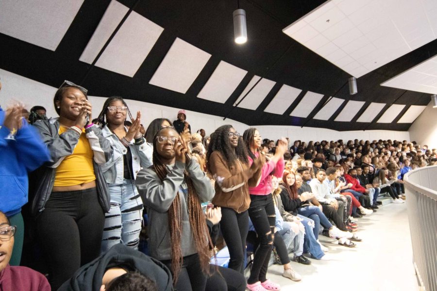 Students dance along to the music performed during the Black History Month Program 