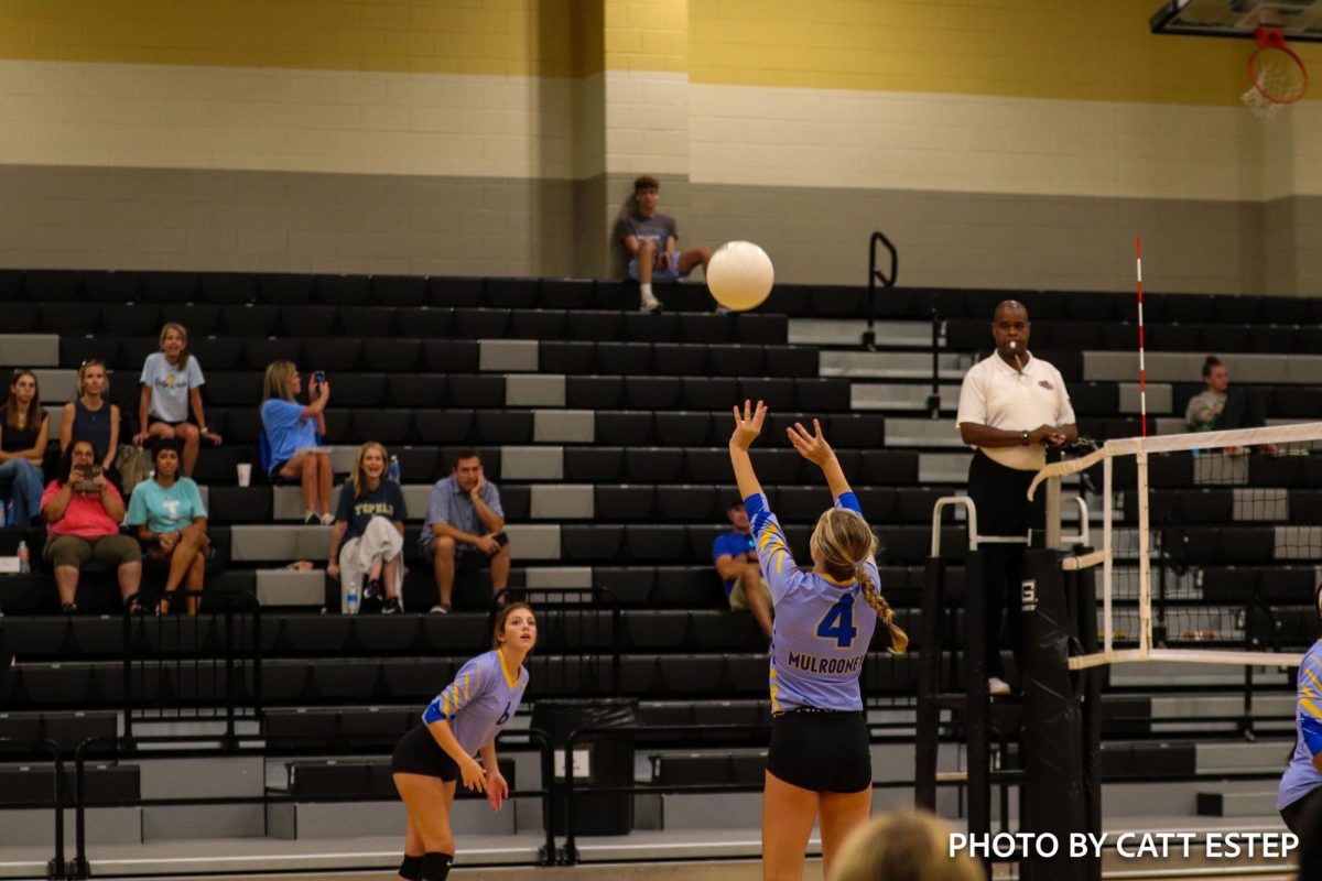 Sophie Mulrooney sets the ball up for Chloee Becker to hit. 