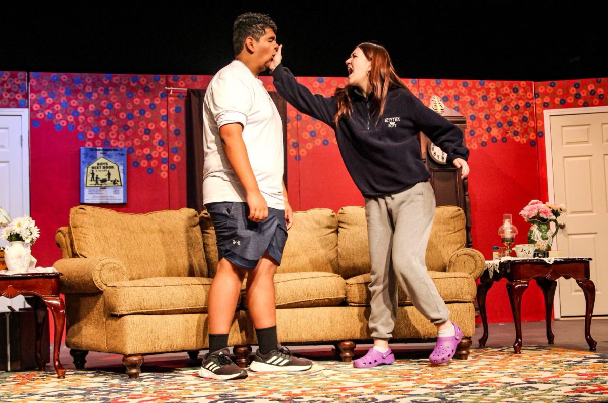 Isabella Jones and Kevin Sepulveda rehearse their slap for the Play that Goes Wrong. 