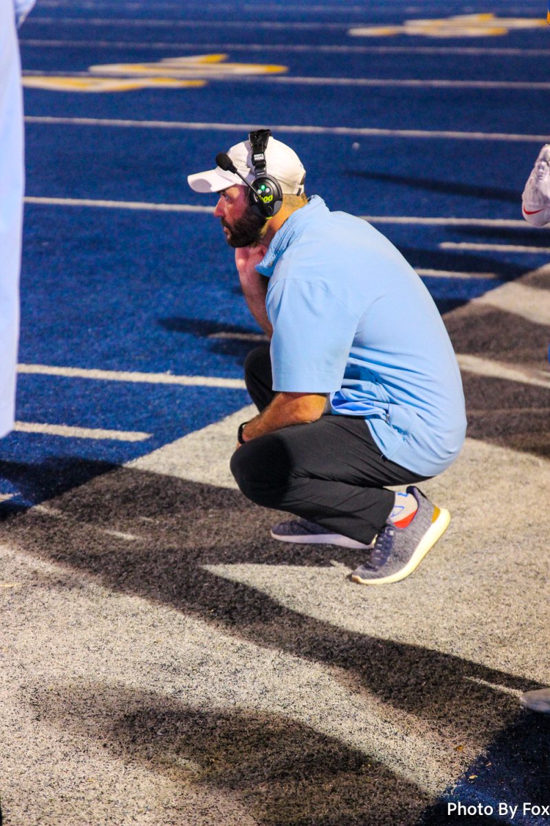 Coach Hardin focuses on the sidelines of the Germantown v. Tupelo football game. 