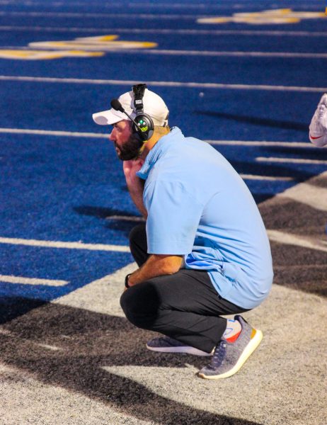 Coach Hardin focuses on the sidelines of the Germantown v. Tupelo football game. 