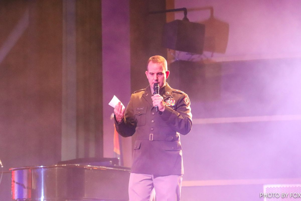 Lt. Col. Derrick J. Holland speaks to Tupelo High School while holding its annual Veterans Day Program in the PAC on Nov. 10. 