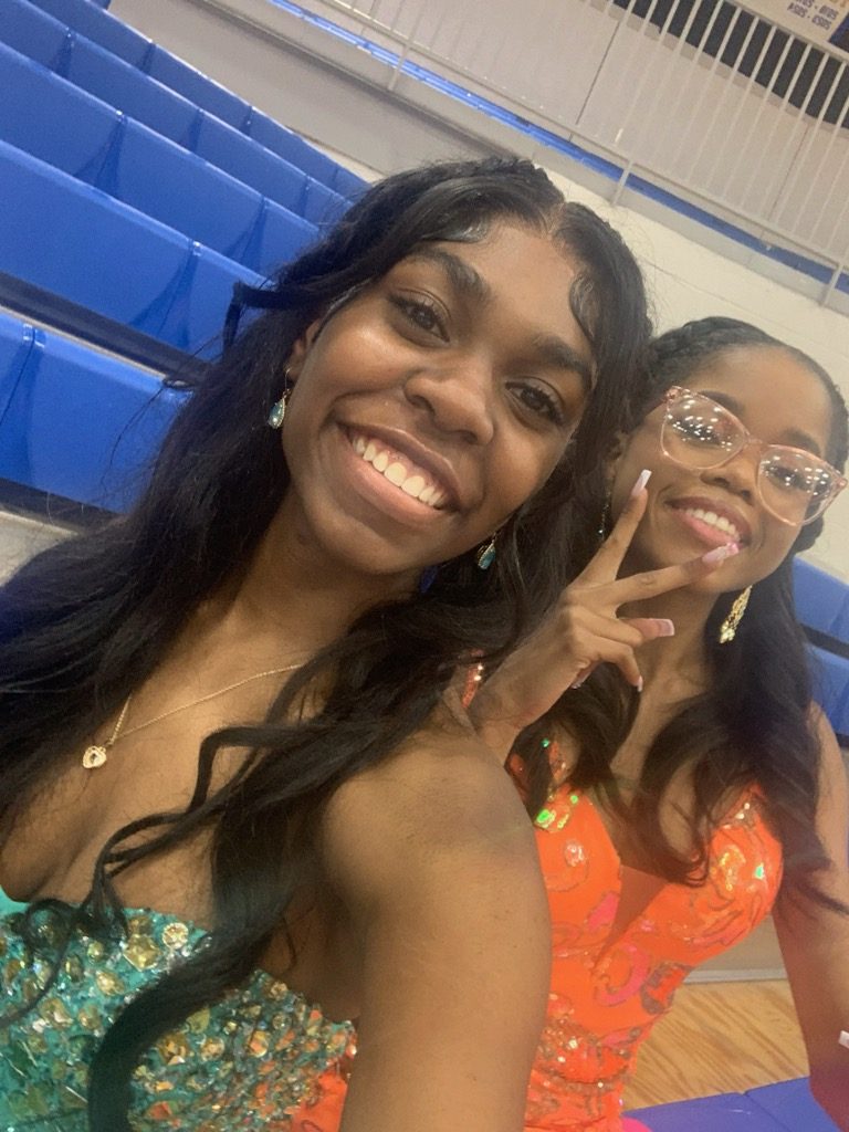 Amedei Ratliff and Kam Pointer pose for a selfie in the Dome Tornado Shelter on Prom night.  