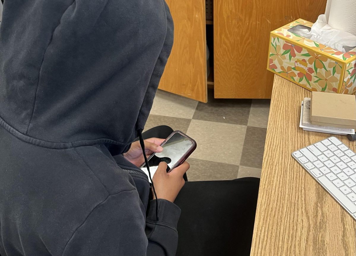 Student on cellphone during class time.