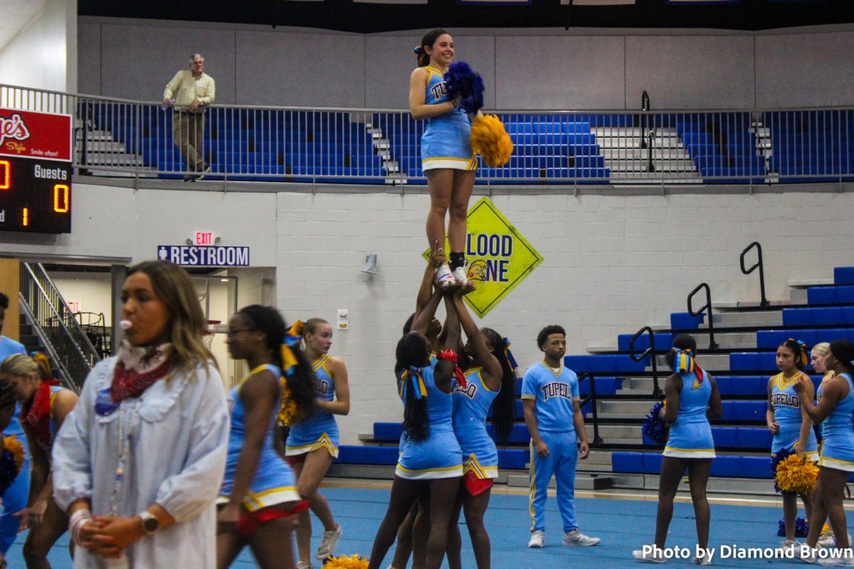 Lacy Kate Mims flying high at the pep rally.