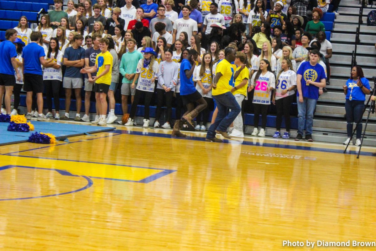 TUPELO Boys with their "Boots on the Ground" at the pep rally.