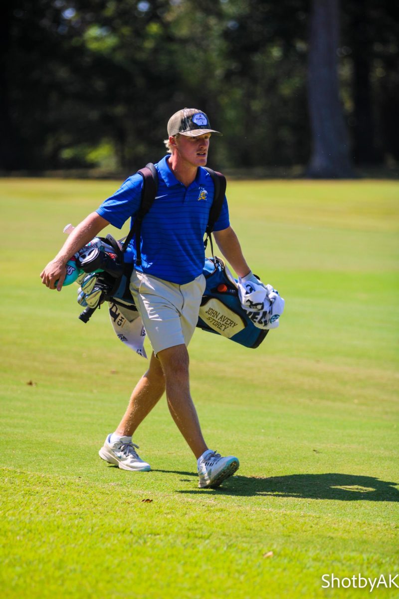 John Avery walking to his next hole with confidence.