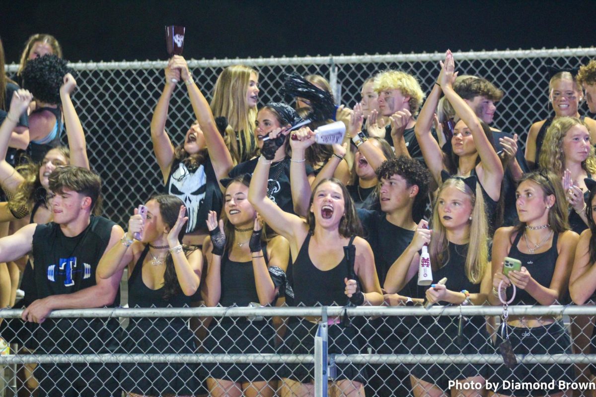Mary Bishop Curtis and the student section hyped up