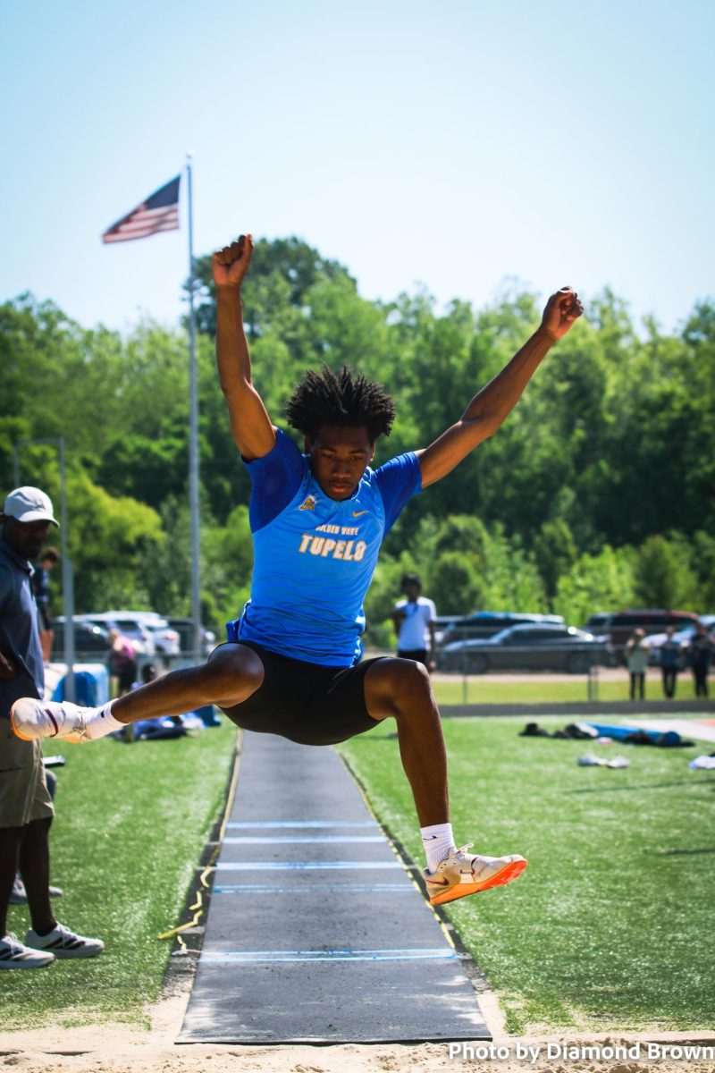 Javeion Lowery doing long jump