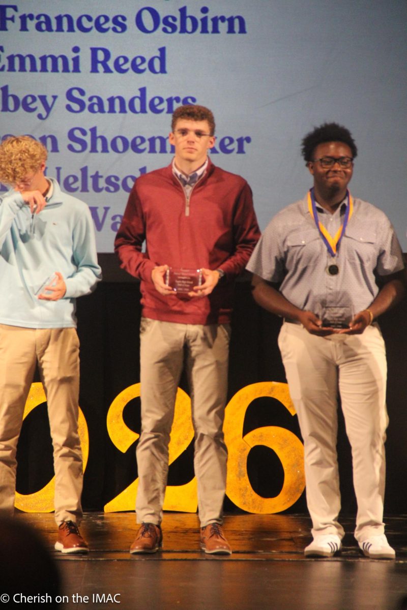 Charlie Farmer, Mason Cordell, and LJ Conley getting their awards